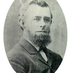 Copy of a formal photograph showing head and shoulders of Thomas Hand, 1839-1888. This photograph has a detailed inscription on the back handwritten by John Lundy-Clarke in 1974.: Thomas Hand 1839-1888 Surveyor for Upper Yarra Road Board 1862-1872. Engineer for Shire of Lillydale 1872-1888. Father of Kate, Eva, Eliza, Florence, Mabel, Alice, Frederick and William. Married Eliza Erith 1862. Owner of Mountain Grange in the present district of Kalorama. Copy of photograph in possession of his daughter Mabel made by JLC in 1974.