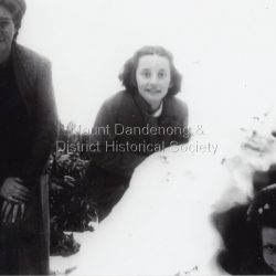 Mrs. Wenborne with Joan and Mary Wenborne in igloo built of snow at Mount Dandenong. (2 copies)