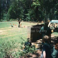 View of Sports Day looking down over the oval with the 'rebound Wall' in the foreground 1997.