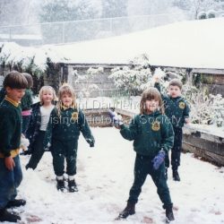 Children playing in snow at the front of Mount Dandenong Primary School 5th September 1995.