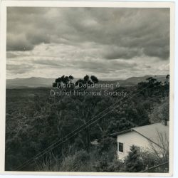 View from Mount Dandenong Observatory Photograph taken from the Observatory car park at Mount Dandenong Observatory Dandenong in 1953. Now the site of the Sky High restaurant. House in foreground. Photograph taken by Sydney Walter Jackson.: On back of photograph: Mount Dandenong Observatory Dandenong Country Aug53