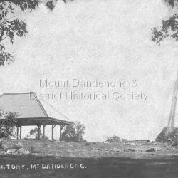 Postcard showing Mount Dandenong Observatory Dandenong Trig Point Observatory on the RHS and a covered shelter on the LHS. Early 1900s.: On front of postcard: Observatory Mount Dandenong