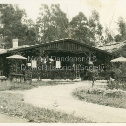 The log cabin, now known as Kelly's which is actually in Mount Dandenong
Reverse reads "Donated by Sue Bosley, Olinda - appeared Ridge Round up, No. 8, Sept. 2011
