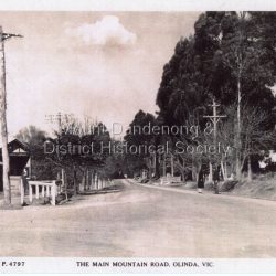 Copy of Rose Series Postcard #4797: Copy of Rose Series Postcard #4797. View down Main Road Olinda towards Sassafras c1940s showing Post Office to the left.Three people visible in picture.