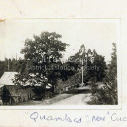 Quamby Café viewed from high side of Main Road looking towards Sassafras c1930. Power lines visible and road unmade. Quamby Café built by the Dorey family in 1914. Now the Cuckoo Restaurant.: On front - Quamby now "Cuckoo"