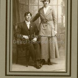 Studio portrait of Alice Dorey and Norman Hamilton taken in 1917. Alice married Norman in 1918. Alice was the sister of Iris Dorey and helped run Quamby Café.: To Dear Iris With Love From Alice & Norman August 11th 1917