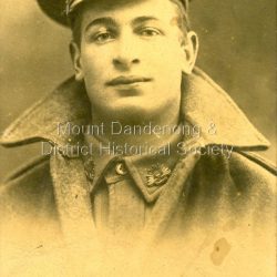 Studio portrait of Eric Haddrick in WW1 uniform. Brother of Eunice Chapman.: Mrs Dorey With best wishes from Eric Haddrick Sept 1917.