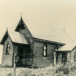 Church of England. Monash Avenue, Olinda. The descriptive text on the reverse of this photograph was hand written by John Lundy-Clarke. Church of England Olinda When the church was built it faced on to the main Mt Dandenong Road but the road was deviated in and the main road section in front of the Village Settlement blocks was named Monash Avenue. The chapel built on Mrs Warners land on Mernda Road (later Coonara Road) was shifted in 1936 by Dick Mitlan using Jack Clarkes Ford truck as traction plant.