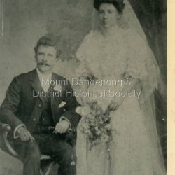 Studio wedding portrait of Tim Dodd and his wife Ett. The descriptive text on the reverse of this photograph was hand written by John Lundy-Clarke.: Jim Dodd and wife Ett. Copied by J.L.C. 1974.