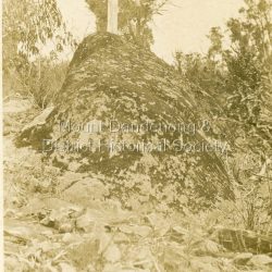 Close up photograph of 'The Rock', a popular tourist destination at Olinda since the late 1800s. The Rock is situated adjacent to the old Olinda Golf Course. The views from The Rock have now been overgrown. This postcard style photograph is c1921.: Written on back in pen: The Rock Olinda.