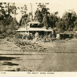 Rose Series Postcard depicting "The Chalet" guest house at Olinda. Built c1906, The Chalet was situated at the southern corner of Chalet and McCarthy Roads. The building was destroyed by fire in 1935 and Ted Woolrich acquired the land.: On front: The Rose Series P. 397
