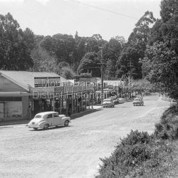 The first building in this area of the Dandenongs was Holden’s Hut, built c.1855 by timber cutter George
Holden with his sons Mark and Luke.
It was situated near this corner in Olinda. The township block was purchased by John Dodd in 1895 to set up a store to supply a wide range of
goods for the early settlers. The local shops continued to supply everything residents needed well into the 1980s The first building in this area of the Dandenongs was Holden?s Hut, built c.1855 by timber cutter George
Holden with his sons Mark and Luke.
It was situated near this corner in Olinda. The township block was purchased by John Dodd in 1895 to set up a store to supply a wide range of
goods for the early settlers. The local shops continued to supply everything residents needed well into the 1980s