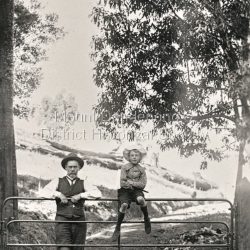 J. G. Roberts with his son Bert (sitting on gate) at the entrance to his country home Sunnyside at South Sassafras (now Kallista).: Entrance To Sunnyside GGM