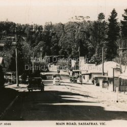 This set of small photographs was produced by the Rose Stenograph Co. c1913 to be included in photograph albums. The 1913 date cannot be correct becasue of the cars visible in and the fact that electricity arrived in 1927. The area known as South Sassafras, was opened up for settlement in 1893 and the name was changed to Kallista in 1925.
A small, paper envelope containing 12 photographs of Sassafras that are reproductions of Rose Series postcards. There are 10 different photographs, SAS0032-01and SAS0032-03 have doubles.
Envelope: Beauty Spots in Australia 12 Real Photographs For Your Snapshot Album Published by the Rose Stenograph Co. Rear 17 Auburn Grove, Armadale, Vic S.E.3 SASSAFRAS, VICTORIA
Photograph SAS0032-01 - The Rose Series P. 905: Clematis Avenue, Sherbrooke, Vic
Photograph SAS0032-02- The Rose Series P. 1603: The Cascades, Sassafras, Vic
Photograph SAS0032-03- The Rose Series P. 204: Panorama at Sassafras, Vic
Photograph SAS0032-04- The Rose Series P. 4046: Main Road, Sassafras, Vic
Photograph SAS0032-05- The Rose Series P. 1502: Sassafras Creek, Sassafras, Vic
Photograph SAS0032-06- The Rose Series P. 1501: Tourist Track, Sassafras, Vic
Photograph SAS0032-07- The Rose Series P. 4244: Tourist Track, South Sassafras, Vic
Photograph SAS0032-08- The Rose Series P. 2725: Clematis Avenue, Sherbrooke, Vic
Photograph SAS0032-09- Main Road, Sassafras, Vic
Photograph SAS0032-10- The Olinda - Sassafras Road, Vic